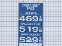 A photo illustration of gas prices against a gridded background